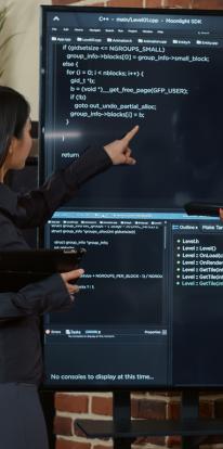 Programmers working at a board